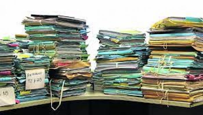 Em caso de duplo ajuizamento, custas são devidas em ambos os processos, mesmo com desistência antes da citação